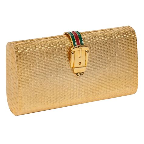 gucci metallic gold clutch|Gucci gold clutch bag.